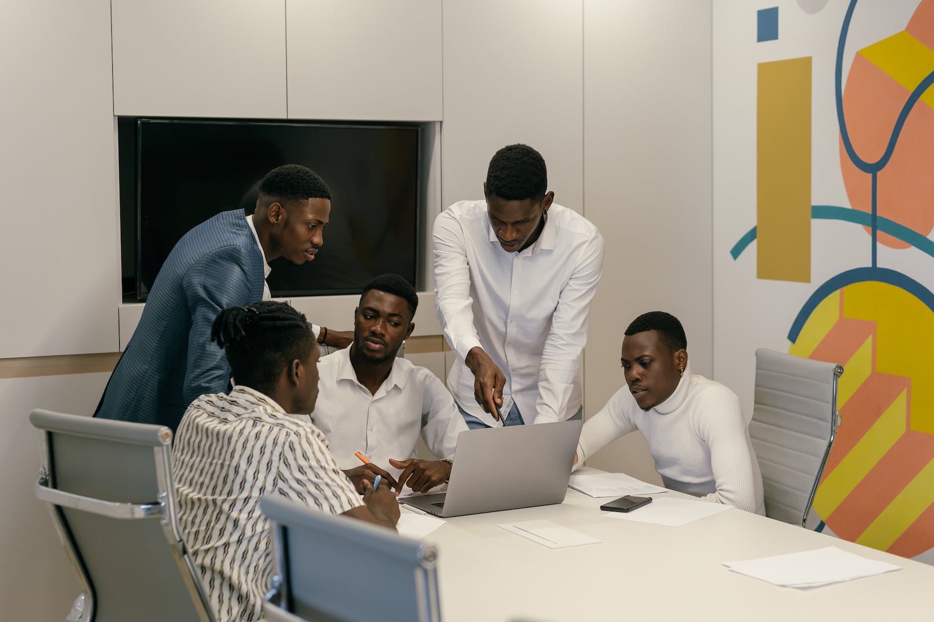 a group of men having a discussion